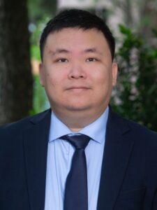 Nhu-Thinh posing for his photo at Ryan Law firm 2025.